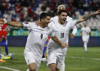 Suarez overtakes Messi in South American qualifiers with exquisite strike