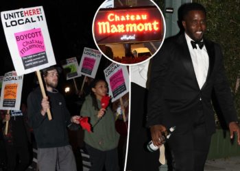 A-listers pass protesters and police to attend Jay-Z's Oscar bash