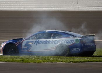 Kyle Larson spins into the infield grass after an on-track incident during the NASCAR Cup Series Folds of Honor QuikTrip 500.