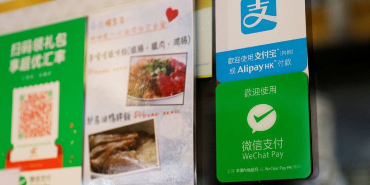 Reeling from China’s crackdown, Alibaba and Tencent readying big job cuts-sources