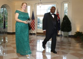FILE - In this Sept. 20, 2019, file photo, Supreme Court Associate Justice Clarence Thomas, right, and wife Virginia "Ginni" Thomas arrive for a State Dinner with Australian Prime Minister Scott Morrison and President Donald Trump at the White House in Washington. Ginni Thomas is using her Facebook page to amplify unsubstantiated claims of corruption by Joe Biden. She is a longtime conservative activist who asked her more than 10,000 followers Oct. 26, 2020, to consider sharing a link focused on alleged corruption by Biden and his son, Hunter, as well as claims that social media companies are censoring reports about the Bidens. (AP Photo/Patrick Semansky, File)