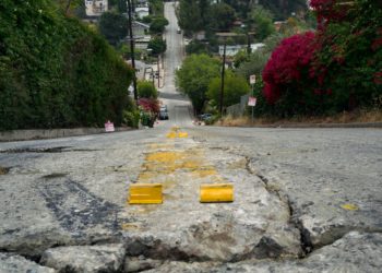 Watch Airborne Tesla's 'Super Dangerous' Jump On Steep Los Angeles Street Go Awry
