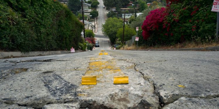 Watch Airborne Tesla's 'Super Dangerous' Jump On Steep Los Angeles Street Go Awry