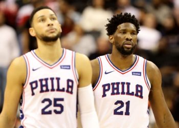 Ben &lt;a href='https://www.sportskeeda.com/player/ben-simmons' target='_blank' rel='noopener noreferrer'&gt;Simmons&lt;/a&gt; (25) and Joel Embiid of the Philadelphia 76ers look on in against the Washington Wizards on January 9, 2019, in Washington, DC.