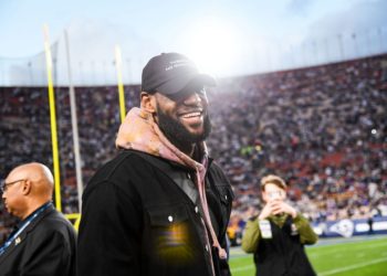 Divisional Round - Dallas Cowboys vs. LA Rams; LeBron James at an NFL playoff game matching two of his favorites against each other.