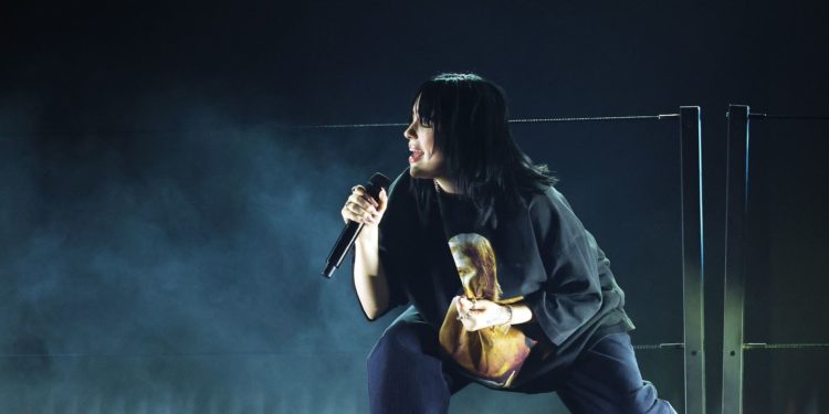 Billie Eilish Tributes Foo Fighters' Taylor Hawkins In Stormy Grammys Performance
