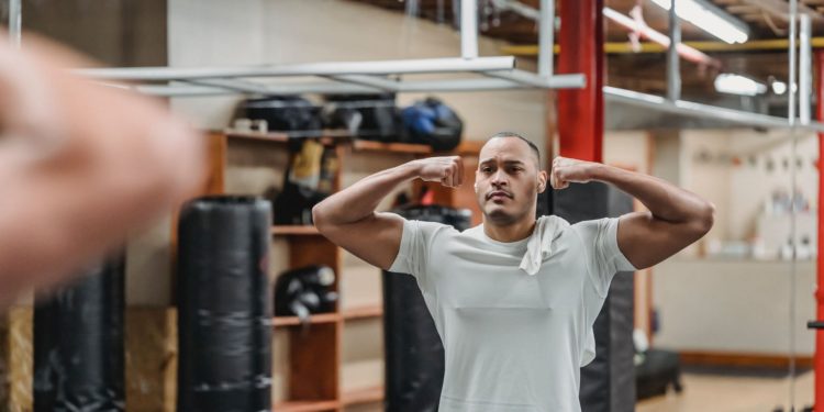 The reverse bicep curl is the most well-known version of the bicep curl (Image via Pexels/Julia Larson)