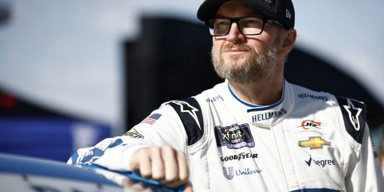 Dale Earnhardt Jr. looks on during practice for the NASCAR Xfinity Series Call 811 Before You Dig 250 powered by Call 811.com at Martinsville Speedway.