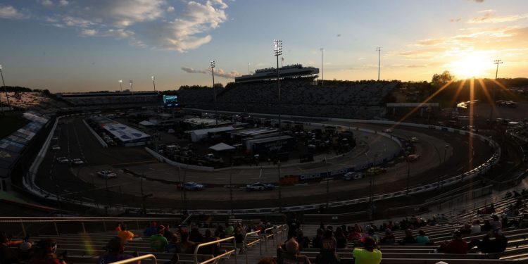 A general view of the race from the grandstands as the sun sets during the NASCAR Cup Series Blue-Emu Maximum Pain Relief 500 at Martinsville Speedway (Photo by James Gilbert/Getty Images)