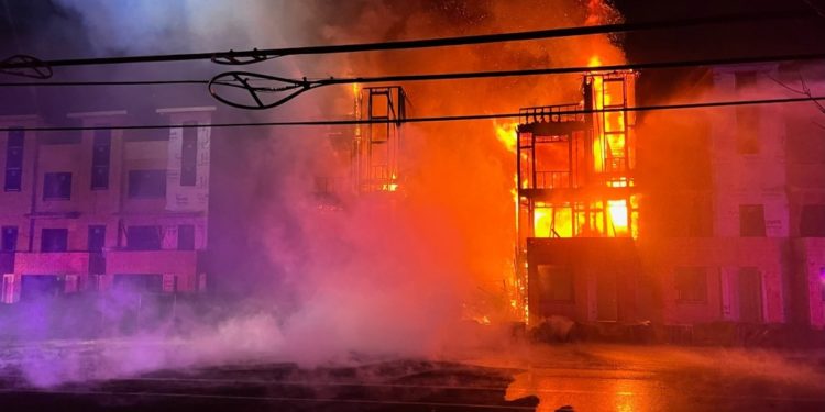 Golden man who allegedly started a $2 million construction fire is arrested.