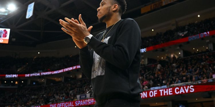 Giannis Antetokounmpo of the Milwaukee Bucks watches from the bench against the Cleveland Cavaliers on April 10 in Cleveland, Ohio. The Cavaliers defeated the Bucks 133-115
