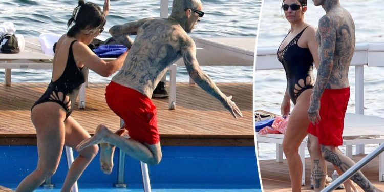 Kourtney and Travis jump into pool hand-in-hand in Italy