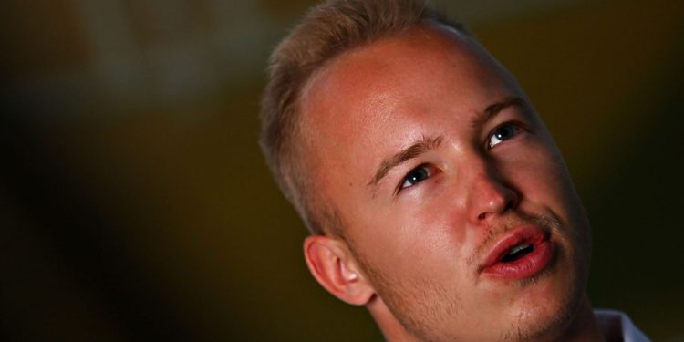 Nikita Mazepin looks on in the Paddock during previews ahead of the F1 Grand Prix of Qatar at Losail International Circuit on November 18, 2021 in Doha, Qatar. (Photo by Clive Mason/Getty Images)