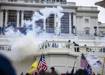 WASHINGTON, DC - JANUARY 06: Pro-Trump supporters storm the U.S. Capitol following a rally with President Donald Trump on January 6, 2021 in Washington, DC. Trump supporters gathered in the nation's capital today to protest the ratification of President-elect Joe Biden's Electoral College victory over President Trump in the 2020 election. (Photo by Samuel Corum/Getty Images)