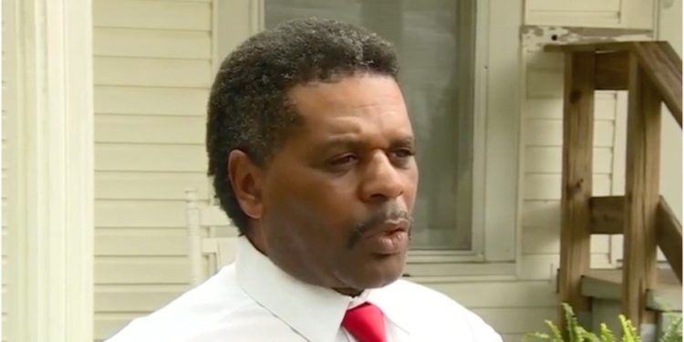 Alabama pastor Michael Jennings says he was arrested for watering a neighbor's roses.