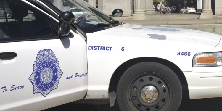 Denver police roll patrol vehicle while chasing shooting suspect