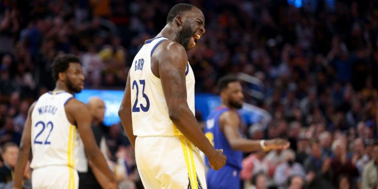 Draymond Green #23 of the Golden State Warriors reacts after he drew an offensive foul on Aaron Gordon #50 of the Denver Nuggets in the first half during Game Two of the Western Conference First Round NBA Playoffs at Chase Center on April 18, 2022