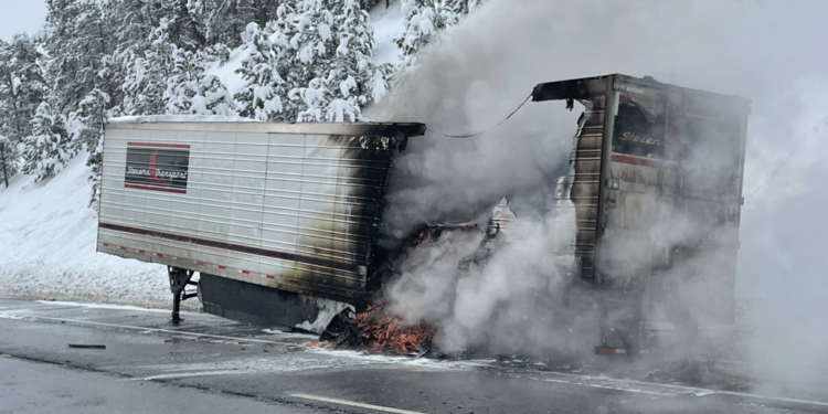 Eastbound lanes of I-70 temporarily shut down in Evergreen area by trailer fire.