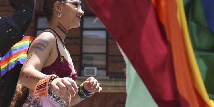 Parkland, Florida, school shooting survivor Emma Gonzales attends the 2018 New York City Pride Parade on June 24, 2018 as participants make their way down 7th Avenue in New York. (Photo by TIMOTHY A. CLARY / AFP) (Photo by TIMOTHY A. CLARY/AFP via Getty Images)