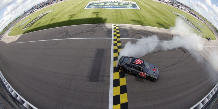 Kurt Busch celebrates with a burnout after winning the NASCAR Cup Series AdventHealth 400 at Kansas Speedway (Photo by Sean Gardner/Getty Images)