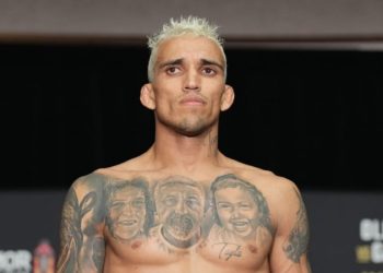 Charles Oliveira on the scales [Image courtesy of @ufc Instagram]