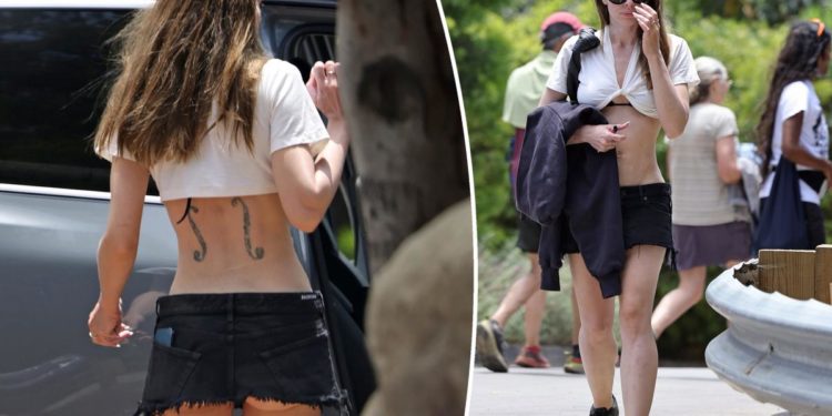 Julia Fox gets cheeky in super-short skirt and twisted crop top