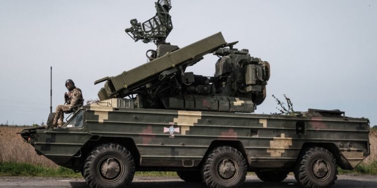 A Ukrainian soldier sits on an anti aircraft missile system near Sloviansk, eastern Ukraine on May 11, 2022, amid the Russian invasion of Ukraine. (Photo by Yasuyoshi CHIBA / AFP) (Photo by YASUYOSHI CHIBA/AFP via Getty Images)
