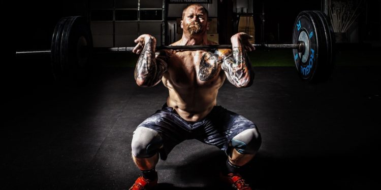 The hang clean is a full-body weightlifting exercise (Image via Binyamin Mellish/Pexels)