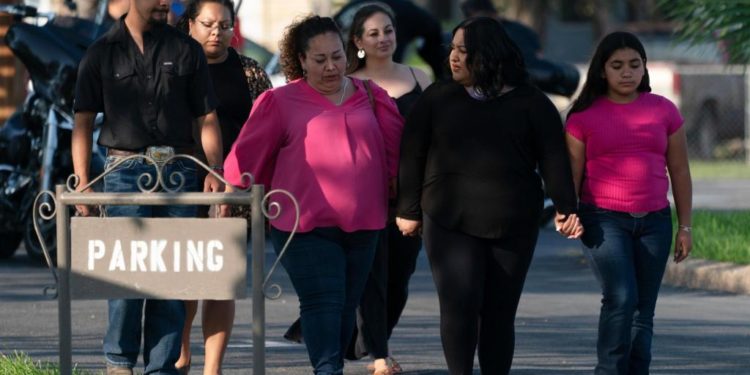 White gloves, small casket, overflow crowd – The Denver Post