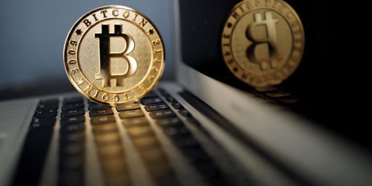 Bitcoin drops as Wall Street shares tumble
