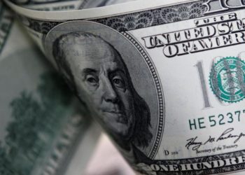Dollar catches a break after bruising week as investors turn risk averse