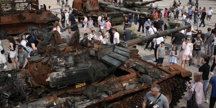 KYIV, UKRAINE - JUNE 04: Crowds gather to view destroyed Russian tanks and armoured vehicles that have been put on display in Saint Michael's Square for public viewing on June 04, 2022 in Kyiv, Ukraine. A sense of normality has increasingly returned to Kyiv as Russia's assault has focused on the eastern Donbas region. (Photo by Christopher Furlong/Getty Images)