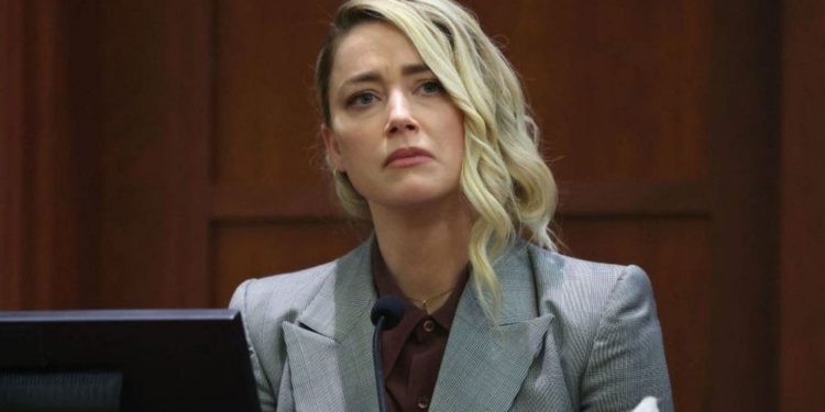 Amber Heard in court (Image via BBC)