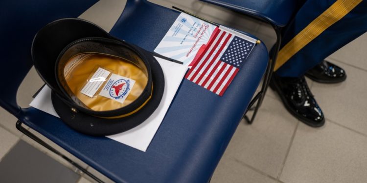 NEW YORK, NEW YORK - JUNE 01: People participate in a special Memorial Day naturalization ceremony at a government immigration office in Manhattan on June 01, 2022 in New York City. The 102 new U.S. citizens, who represent over 30 countries, included a number of active duty members of the U.S. military. (Photo by Spencer Platt/Getty Images)
