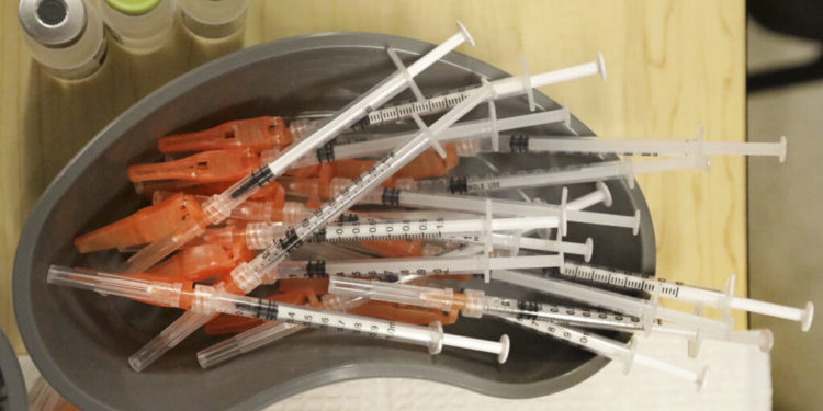 FDA recommends vaccine makers update Covid shots to target Omicron