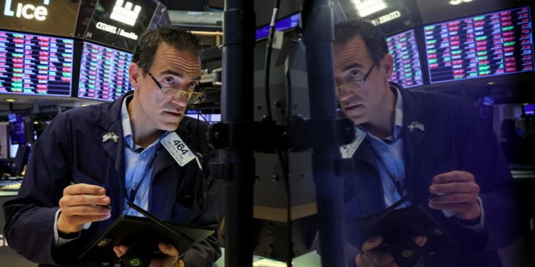 Wall St drops as investor jitters climb before CPI data Friday