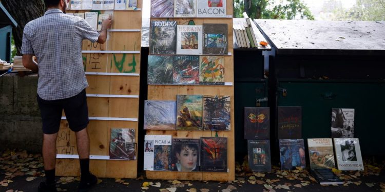 ‘It’s wonderful,’ say riverside booksellers as tourists return to Paris