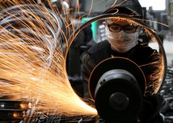 China unexpectedly cuts key rates as economic data disappoints