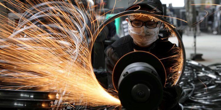 China unexpectedly cuts key rates as economic data disappoints