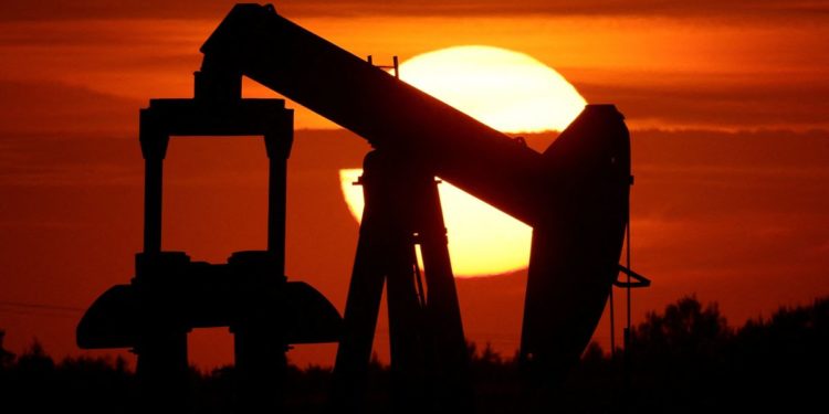 Oil prices jump after U.S. crude, fuel stocks drop, dollar weakens