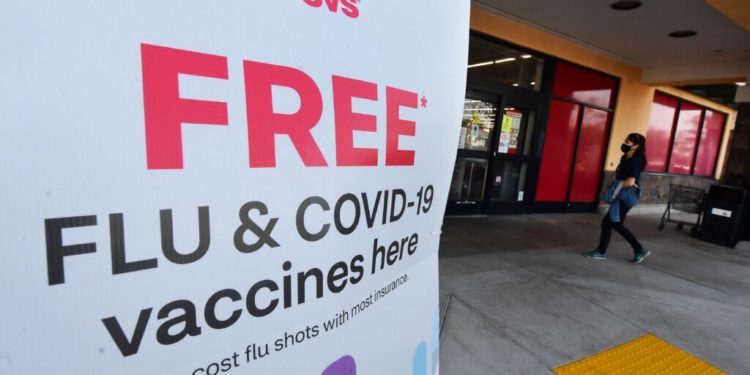 Doubling up on Covid, flu shots may have downside, experts say