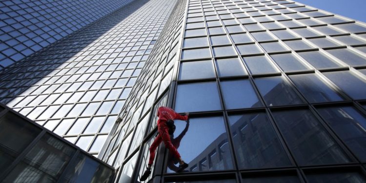 ‘French Spiderman’ climbs Paris skyscraper to mark turning 60