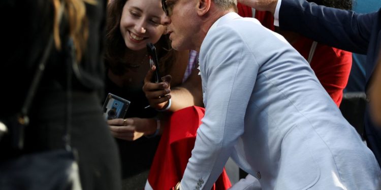 Daniel Craig says he was ‘very lucky’ to work with Queen Elizabeth
