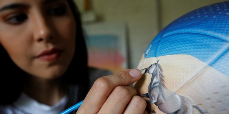Paraguay artist who painted boots for Messi looks to bring color to World Cup