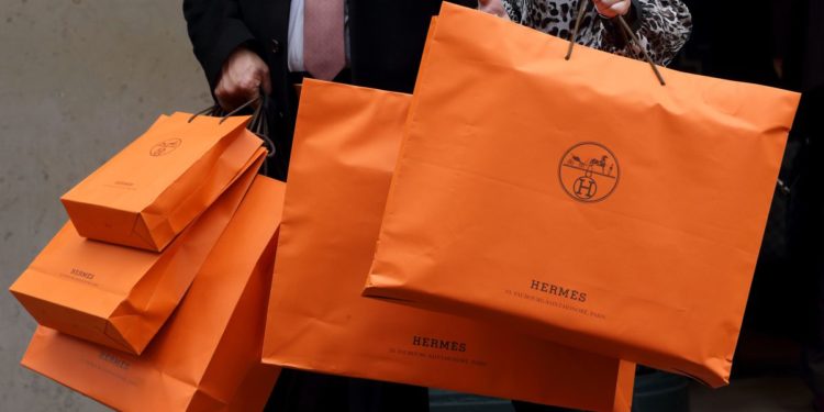 Affluent splash out on pricey Birkin bags but clouds loom