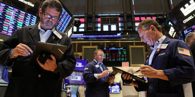 Wall Street closes lower as the Fed pounds rate hike drum