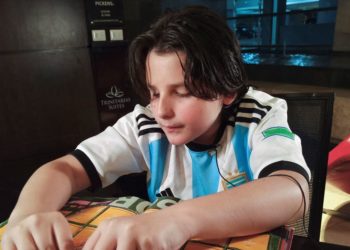 Blind Venezuelan boy converts World Cup sticker album into Braille