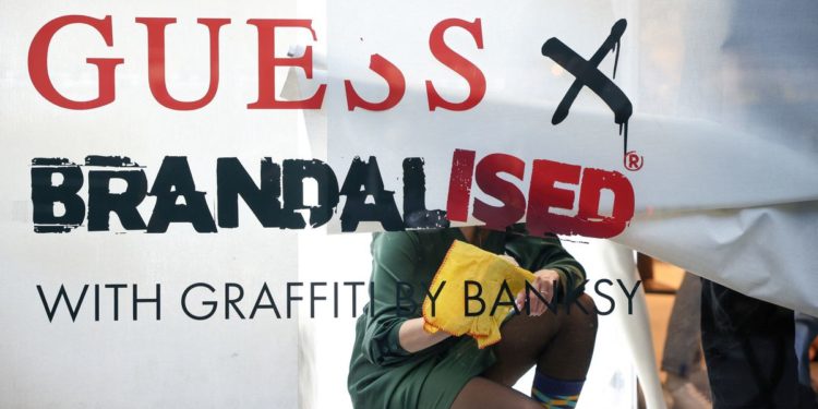 Banksy says fashion retailer Guess ‘helped themselves’ to his work
