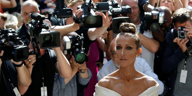 Celine Dion reveals she has rare neurological disorder, postpones shows