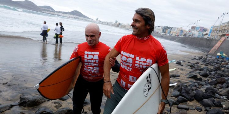 ‘The limit is in your head’ – disabled surfers compete in Canary Islands